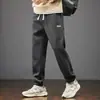 Calça de Moletom Casual Pesada Transfronteiriça Masculina 2025 Nova Primavera e Outono Solta Calças Esportivas de Outono e Inverno para Adolescentes