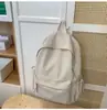 Mochila nueva estilo japonés, minimalista y ligera, perfecta para estudiantes universitarios, versátil, elegante, con gran capacidad, adecuada para viajes casuales, y disponible en colores lisos