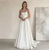 Atacado transfronteiriço suspensório francês cetim vestido de noiva leve cauda noiva vestido de noiva principal casamento ao ar livre gramado vestido de noiva luxo leve
