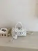Bolso cruzado de lunares de nicho súper popular transfronterizo para mujer, nuevo modelo 2026, bolso cruzado exquisito y versátil, bolso de mano elegante, bolso Boston