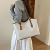 Bolso grande de estilo retro para mujer, nuevo bolso de hombro versátil de otoño 2026, bolso tote diario de estilo coreano para el trabajo