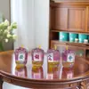 Joyería de Botella de Arena Movediza de Dibujos Animados Mahjong Aceite Taza de Iceberg Llavero Flotante Bolsos para Hombres y Mujeres Mochila Exquisita Colgante