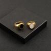 Anillo simple europeo y americano de acero de titanio para hombre y mujer, personalizado, goma negra, anillo de gema para mujer, acero inoxidable, anillo dorado con pegamento