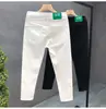 Cyber Popular Jeans Negros Puros para Hombre Marca de Moda Slim-fit Pantalones Recortados de Pie Pequeño Pantalones Casuales Blancos para Hombre Tipo Espiritual