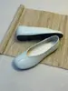 Versión de piel de oveja~bailarinas planas poco profundas de punta redonda simples retro para mujer 2026 nuevos zapatos versátiles para el trabajo