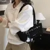 Bolso de axila con estampado de leopardo estilo coreano para mujer, nuevo modelo 2026, con decoración de hebilla de cinturón tachonada, bolso de hombro y bolso tote versátil