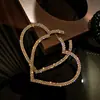 Brincos de Coração Exagerados Cheios de Diamante Estilo Europeu e Americano Argola Simples de Moda com Temperamento Brincos de Personalidade Transfronteiriços para Celebridade da Internet