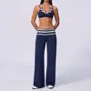 Pantalones de yoga a rayas transfronterizos de cintura alta, sujetador sexy de cuello halter de dos piezas simulado, ropa deportiva para correr y fitness, conjunto de pantalones deportivos ajustados
