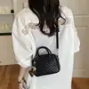 Bolsa de tecido vintage de nicho de alta qualidade para mulheres, nova bolsa transversal versátil de outono de 2026, bolsa almofada de mão super popular