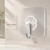 Venta al por mayor pasta transparente sin perforaciones Gancho Lijia fuerte uso gancho invisible sin costuras pared puerta gancho pequeño gancho adhesivo