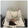 Bolso Pequeño de Cadena Ondulada de Lujo Ligero de Moda Nuevo Retro para Mujer con Sensación de Alta Gama Bolso de Hombro Bolso Cruzado de Nicho Francés