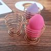 Estante de almacenamiento de borlas de metal de fábrica, estante antimoho para borlas de maquillaje, estante para huevos de belleza, venta al por mayor