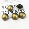 Suministrados directamente de la fuente, los botones de hongo metálicos brillantes cosidos a mano son adecuados para trajes, abrigos, cortavientos y camisas.. Gran Cantidad y Buen Precio