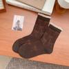 Calcetines sin hueso para niños calcetines de felpa rojos Ancora otoño e invierno graffiti lazo algodón puro oreja de madera calcetines femeninos