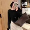 Suéter de punto trenzado a la moda de un solo hombro estilo perezoso para mujer, nuevo de otoño, holgado, adelgazante, versátil, con temperamento, top elegante