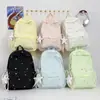 Mochila Bordada com Bolinhas Pastel Cor de Pêssego, Mochila Escolar Simples para Alunos do Ensino Fundamental, Mochila de Campus Leve e Fashion para Alunas do Ensino Médio