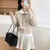 Cardigan de punto trenzado con cuello de muñeca y lazo estilo universitario, novedad de otoño, abrigo suéter dulce a la moda para rejuvenecer, para mujer