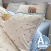 Juego de cama de cuatro piezas Clase A hecho de algodón puro tipo puff, sábana y funda de edredón estilo ins frescas y delicadas con borde de concha, juego de tres piezas para dormitorios de estudiantes