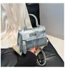 Bolsa Pequena para Trabalho Casual para Mulheres 2026 Novo Estilo Elegante Texturizada Bolsa de Ombro Transversal Estilo Primavera e Verão Bolsa de Mão Kelly