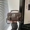 Bolso pequeño con textura retro para mujer 2026 primavera nuevo estilo moda japonesa coreana bolso de hombro único bolso de mano versátil bolso cruzado tipo almohada