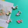 Accesorios de resina de flor de durazno accesorios de flor de cerezo material para tocado DIY pegamento de crema casero funda de teléfono DIY zapatos con agujeros al por mayor