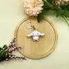 Nuevo Llavero de Perro de Orejas Grandes de Dibujos Animados para Mujer, Lindo Perro Canela, Kuromi, Muñeco Llavero Melody, Pequeño Regalo