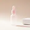 Botella de vidrio con gotero de punta de goma rosa para dispensar esencia y aceite esencial, botella vacía en opciones multtamaño de 20 ml/30 ml/50 ml, botella cosmética