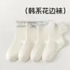 Calcetines de algodón sin costuras 2026 modelo nuevo para niñas, primavera y otoño estilo coreano calcetines con encaje y adorno grande para niñas mayores y estudiantes