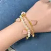 MOY Original Moda Francesa Temperamento Rosa Suave Corazón de Melocotón Forma de Corazón Piedra en Polvo Cadena de Perlas Pulsera al por Mayor