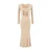 Novo conjunto de duas peças elegante estilo europeu e americano, composto por vestido bodycon justo com alças que acentua a figura e um cardigã casual de afinar a cintura.