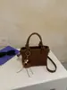 Bolso tipo cubo de tejido de alta gama para mujer, nuevo y elegante, estilo verano chic, de un solo hombro y cruzado