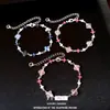 Pulsera de flor con patrón de orquídea y cristal color fresa de circón, pulsera de lujo ligero de alta gama, pulsera elegante, joyería de moda y versátil