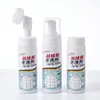 Agente de Limpieza en Seco para Chaquetas de Plumas 200ml Espuma Limpiadora de Lavado sin Agua para el Hogar con Cabezal de Cepillo Integrado Potente Removedor de Manchas de Aceite Artefacto