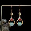 Brincos giratórios estilo chinês com folha de ouro, esmalte de jade Hetian incrustado com ouro de alta qualidade, brincos Fu Lu, nicho simples