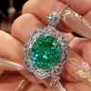 2026 Nuevo Zhuangshengsheng Joyería Cobre Chapado en Oro Espinela Azul Imitación Anillo con Colgante de Gota para Mujer 15*18