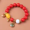 Pulsera de Raíz de Bodhi de Jade Rojo Especificaciones 1.2 con Colgante de Campana de Oro Arena Pulsera de Rosario para Hombres y Mujeres Venta al por Mayor