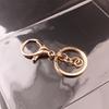 Venta al por mayor de fábrica, llavero, anillo, cadena, colgante de metal, accesorios, cierre de langosta, conjunto de tres piezas, accesorios de joyería DIY que conservan el color