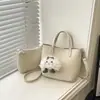 Bolso cruzado texturizado retro minimalista de Shuai Mi, bolso de mano elegante, bolso cuadrado pequeño, nuevo bolso de alto valor para el verano 2026