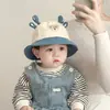 Gorro de bebé primavera y otoño coreano súper lindo cuerno de ciervo niño gorra tipo cubo primavera delgado protector solar para bebé niño gorra de pescador