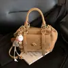 Bolsa de Almofada Retro de Moda Transfronteiriça para Mulheres 2026 Nova Versátil Bolsa de Mão e Bolsa Transversal Grande Capacidade Inverno para o Trabalho Bolsa de Ombro
