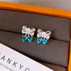 Aretes de Cristal con Forma de Corazón y Mariposa, Aretes de Botón con Circonita, Perla y Moño, Aretes de Lujo Ligero, Sensación de Alta Gama, Accesorios de Aretes Simples y Modernos, Versátiles