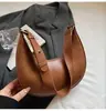 Bolsa de Ombro Único Texturizada de Alta Qualidade Formato Meia-Lua 2026 Nova Tendência Simples Versátil Bolsa de Axila Bolsa Pequena Casual para Comute para Mulheres