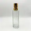 Suministrado directamente por el fabricante, botella de crema con relieve en forma de diamante de lujo ligero con tapa dorada brillante, botella de juego de crema loción, materiales de embalaje cosmético en stock