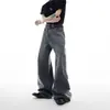 Diseño americano cruzado estilo hombres y mujeres remaches metálicos de moda pantalones holgados de pierna recta pierna ancha estilo high street jeans