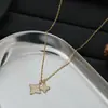 Cadena de Clavícula Elegante Chapada en Oro Real con Circonita Microincrustada Diseño de Nicho para Mujer Collar de Estrella de Cuatro Puntas Collar Exquisito Versátil