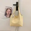 Bolso Tote Casual Estilo Ins para Mujer 2026 Nuevo Modelo Bolso de Viaje de Alto Valor para el Trabajo Bolso de Mano Simple Bolso de Hombro de Lona