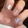 Armadura de mano sentido avanzado hecho a mano ins explosiones diamante roto mariposa uña piezas de uña al por mayor uñas portátiles