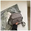 Atacado Transfronteiriço 2026 Nova Bolsa de Mão Estilo Coreano Bolsa Concha Macaron Moda Versátil Ombro Transversal Bolsa de Nylon