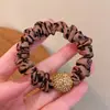 Elástico de malla con estampado de leopardo para el cabello, anillo de organza elegante y con estilo, accesorio para el cabello para niñas