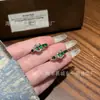 Anillo con hebilla de herradura de jadeíta natural al por mayor del fabricante para Xiaohongshu con incrustación de plata s925, diseño fresco y simple